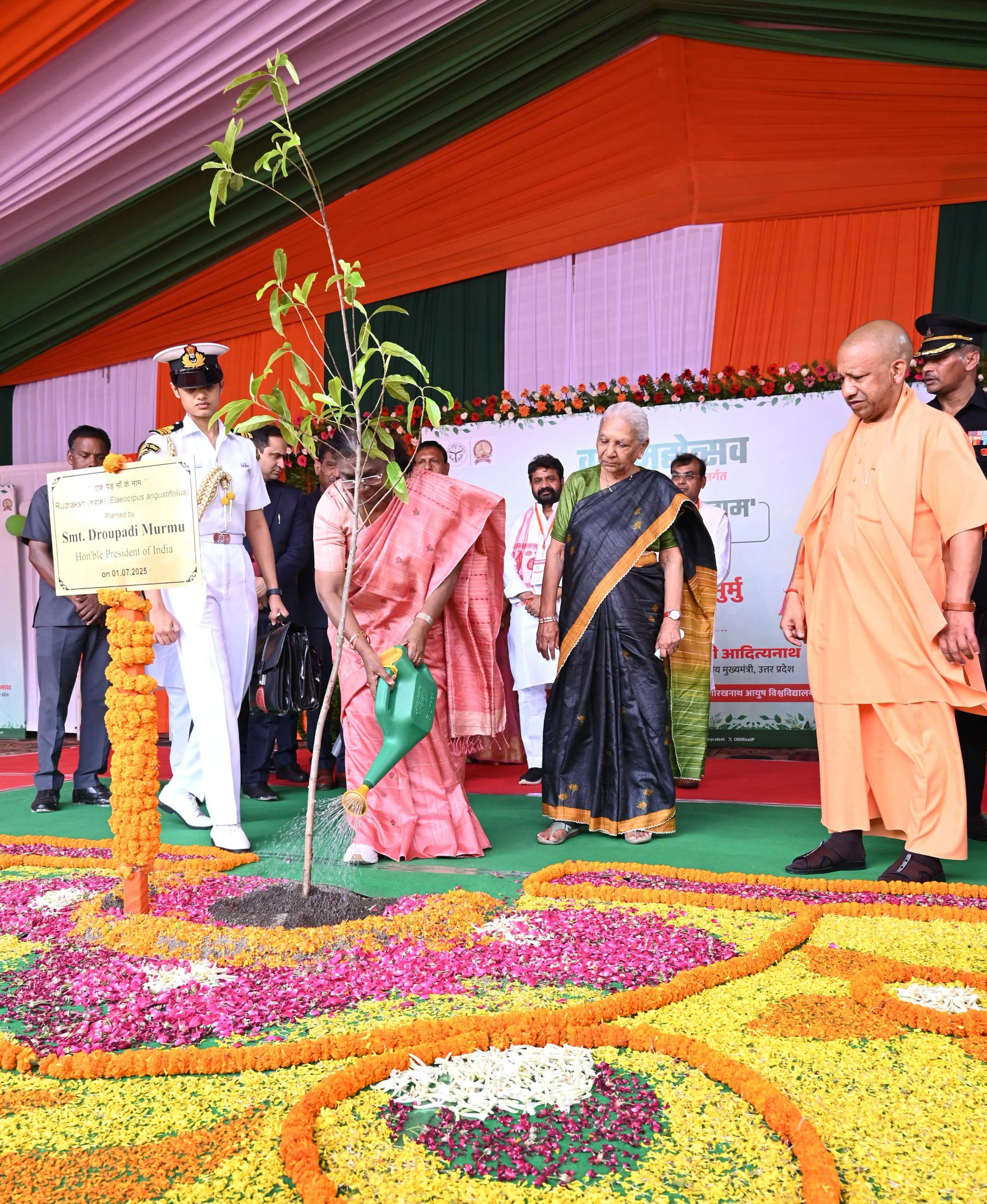 Hon'ble President Smt. Draupadi Murmu ji planting a sapling at Mahayogi Gorakhnath Ayush University, Gorakhpur on the occasion of Van Mahotsav on 01 July, 2025 in the dignified presence of Hon'ble Governor Anandiben Patel ji and Hon'ble Chief Minister Yogi Adityanath ji.